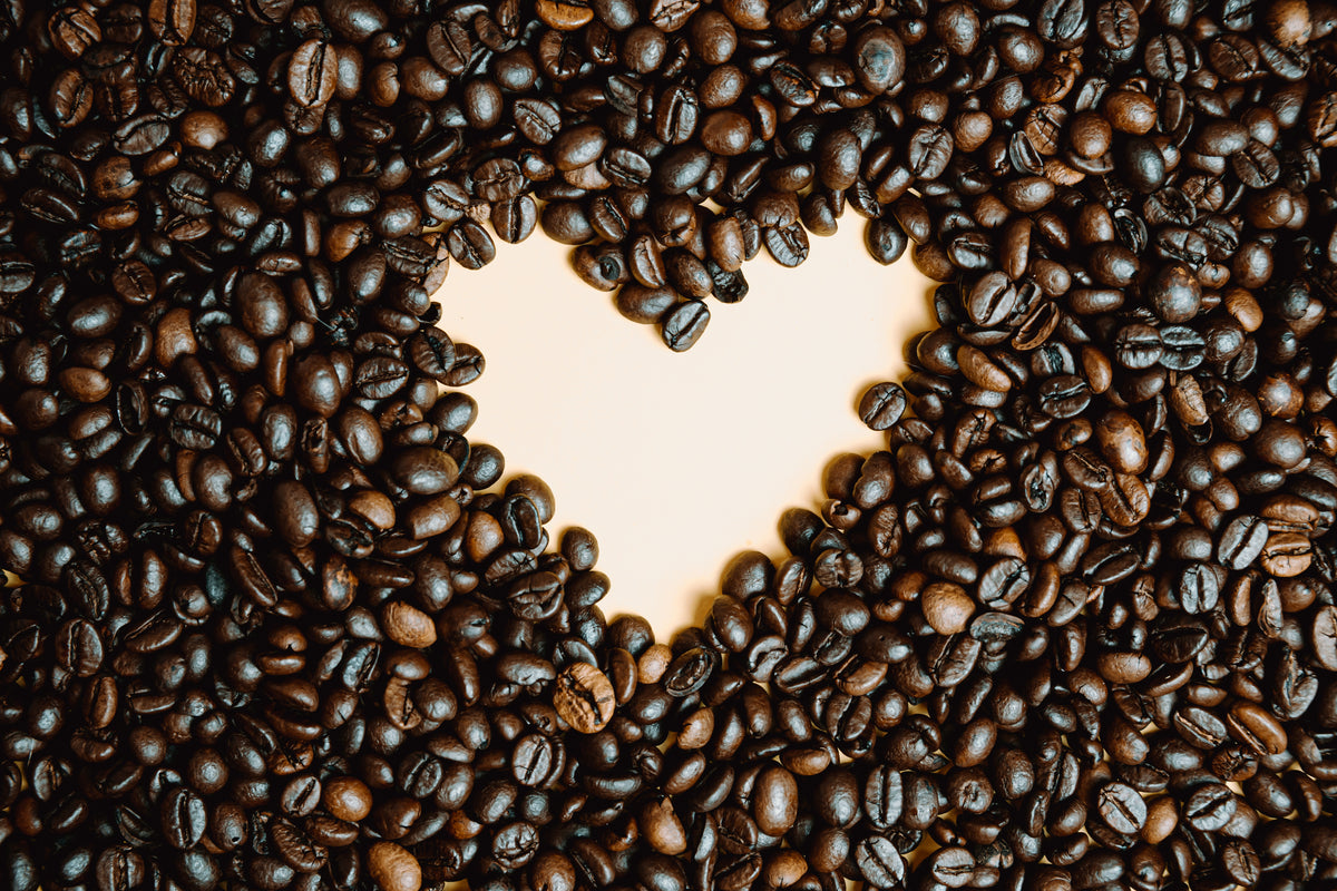 coffee-beans-laid-on-a-pink-background