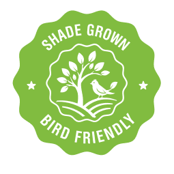 Green badge with 'Shade Grown Bird Friendly' text and tree design on a white background