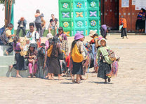 Community gathering in front of church in small village in Chiapas, Mexico.