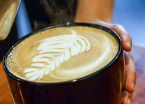 Cappuccino art. Organic espresso beans. Swiss Water Process decaffeinated espresso beans.